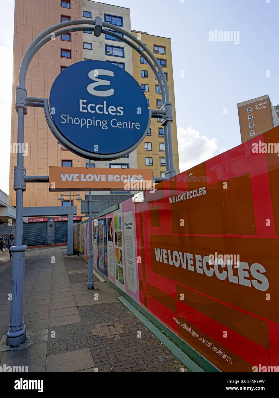 Eccles Shopping Centre entrance and EcclesVision We Love Eccles branding during Muse town centre redevelopment in Eccles, Salford, August 2026. Stock Photo