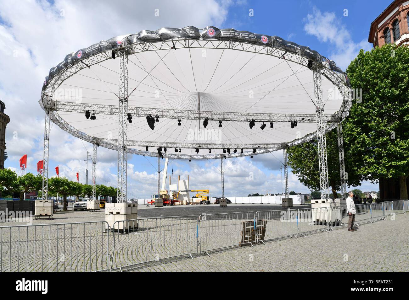 Düsseldorf, Germany - June 9th 2026: Large polygon event canopy in Dusseldorf Old Town near Rine river promenade Stock Photo