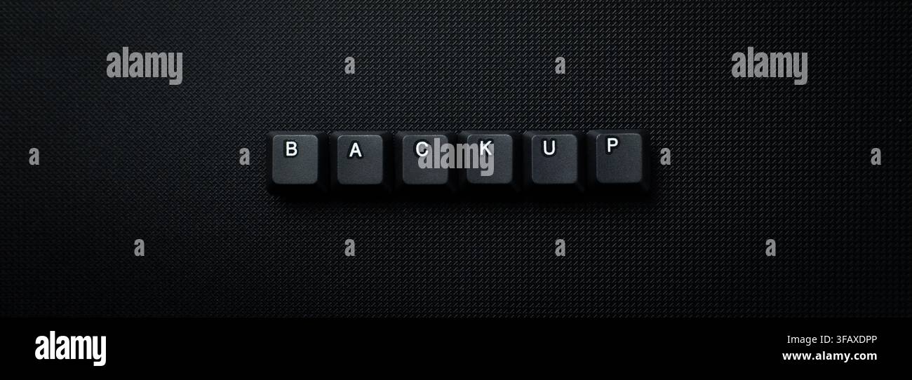 Backup Data Storage Concept With Keyboard Keys On Dark Background Stock Photo