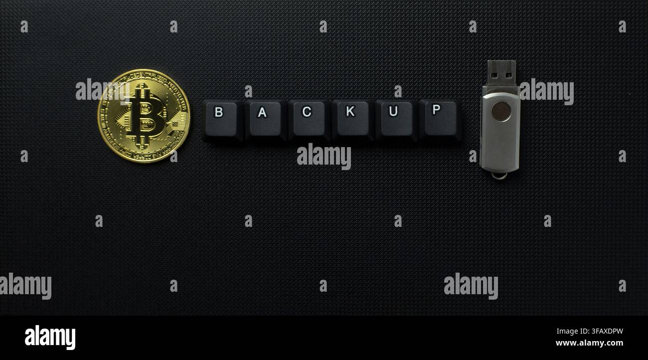 Bitcoin Backup Security Concept With USB Drive And Keyboard Keys Stock Photo