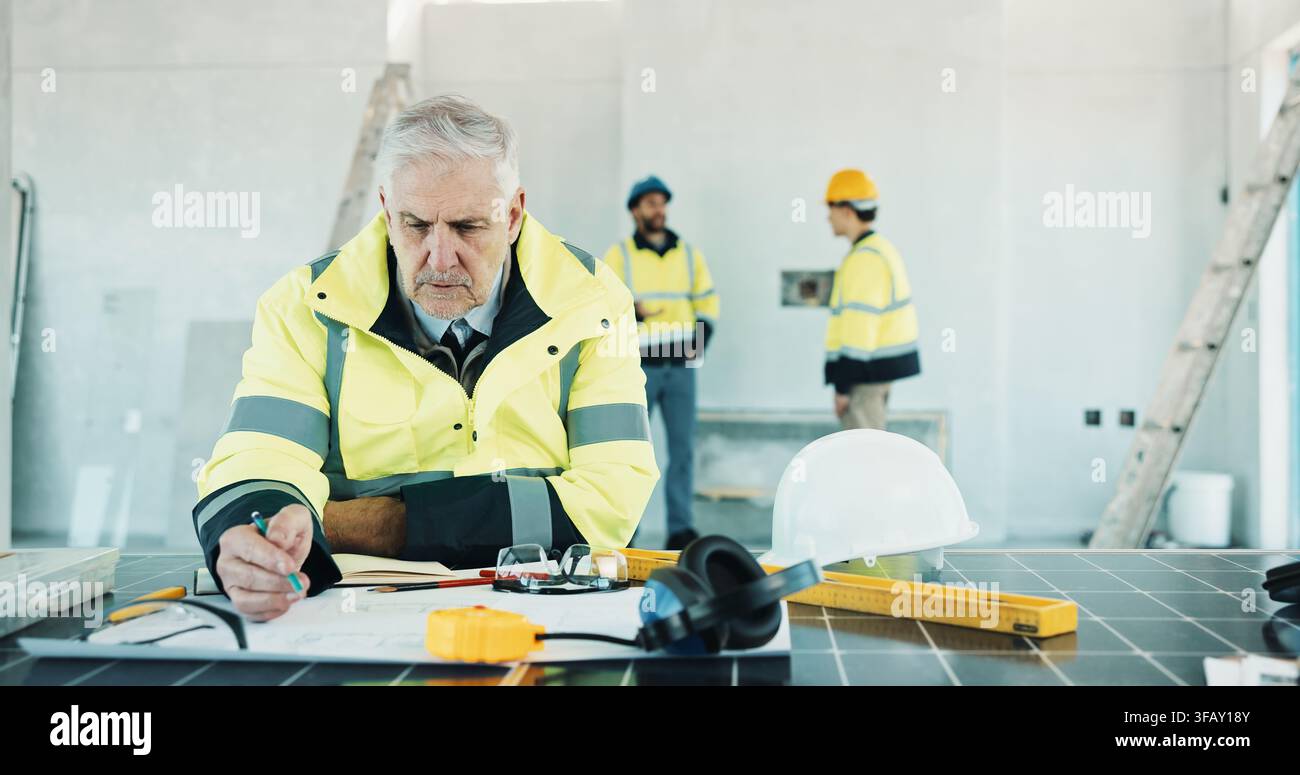 Engineer, drawing and man with blueprint, construction or plan for property development with design. Architecture, sketch and mature person with Stock Photo