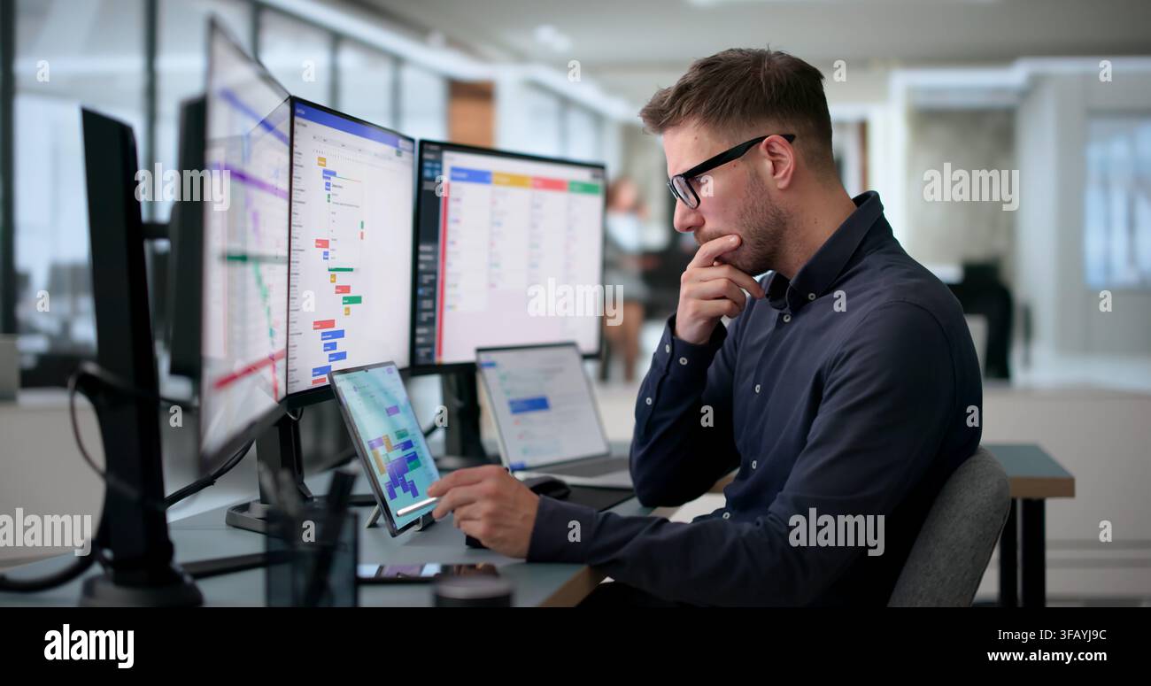 Agile Manager Updates Digital Planner To Organize Team’s Project Tasks Efficiently. Stock Photo