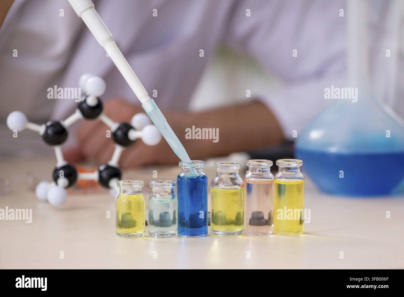 Young chemist working in laboratory Stock Photo