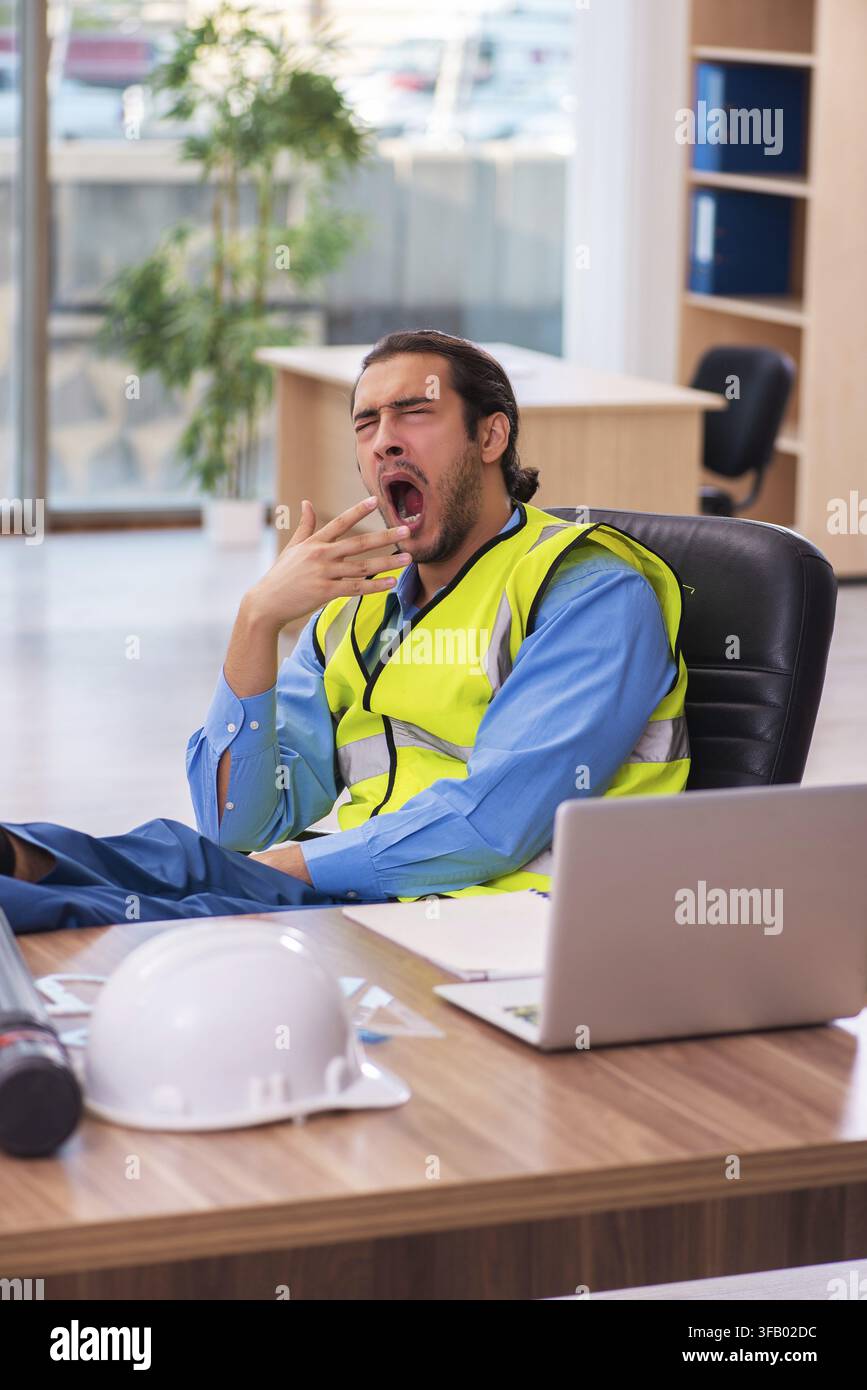 Young architect working in office Stock Photo