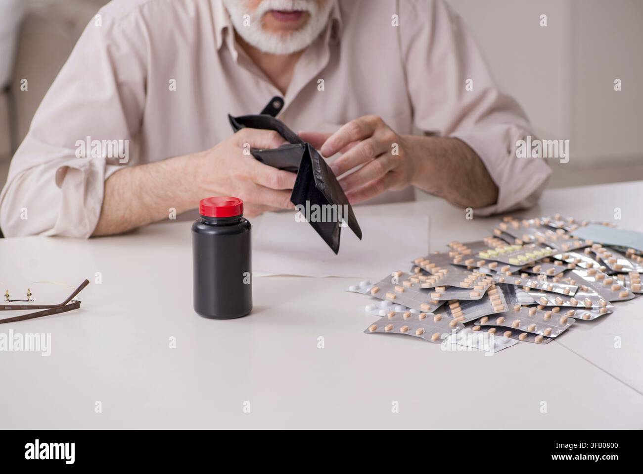 Old man is suffering at home Stock Photo