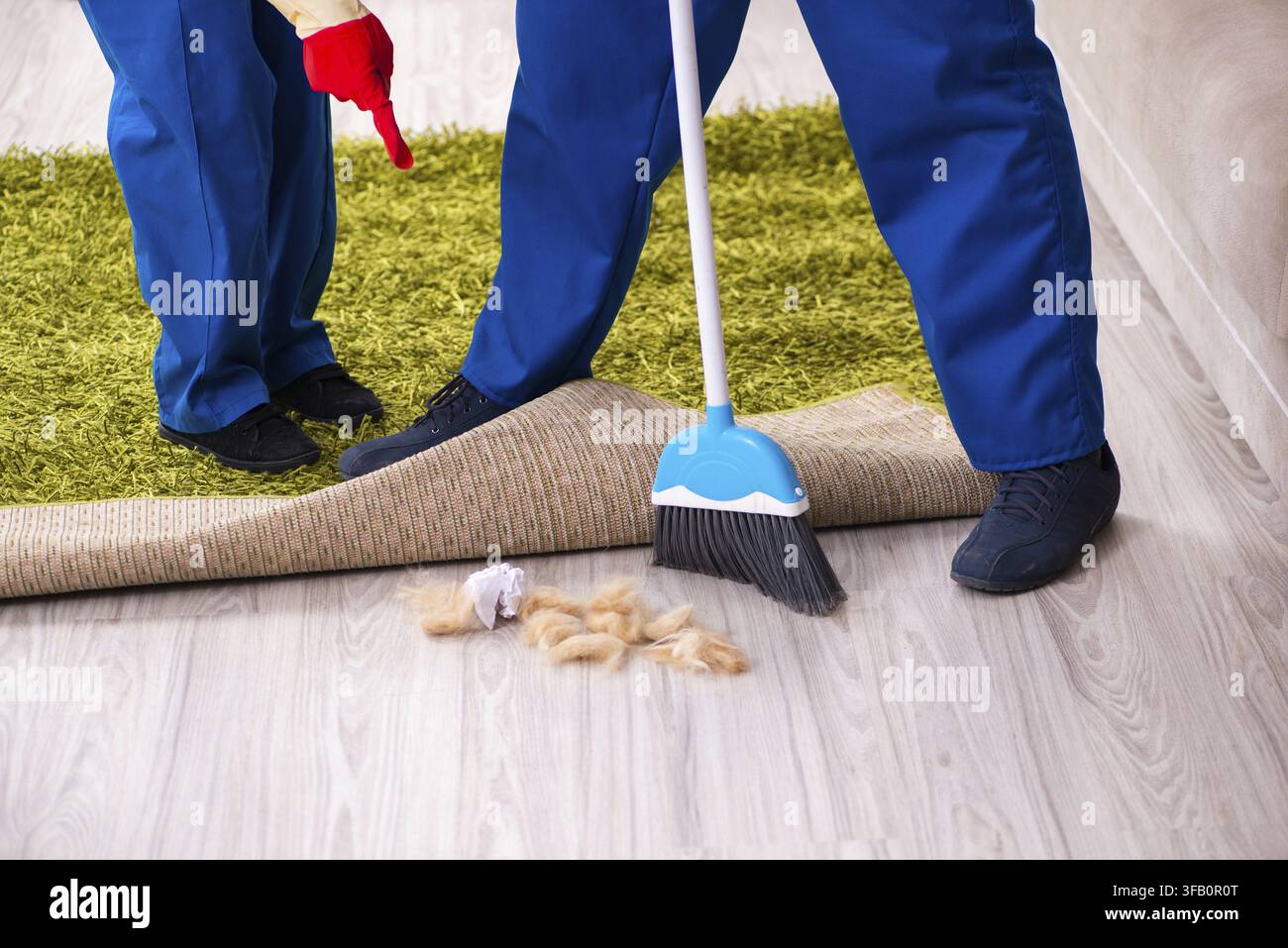 Young couple doing housework at home Stock Photo