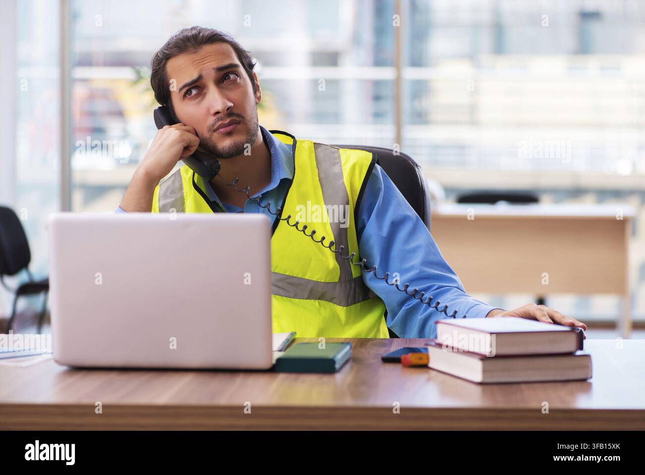Young architect working in office Stock Photo