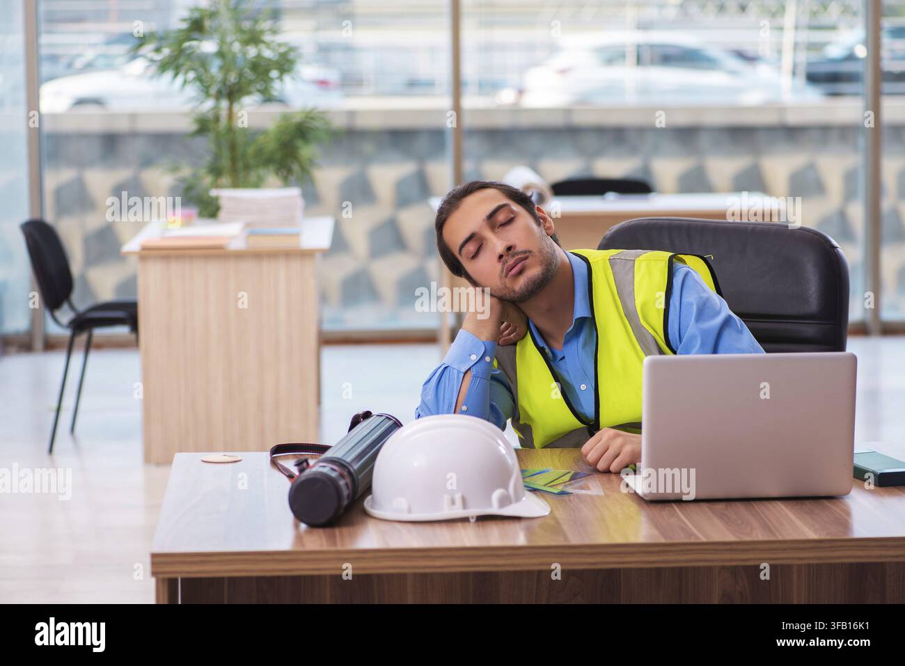 Young architect working in office Stock Photo