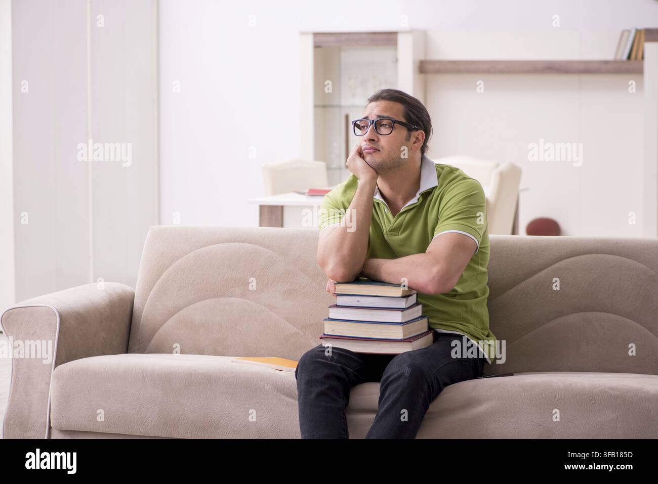 Young student preparing for exams at home Stock Photo