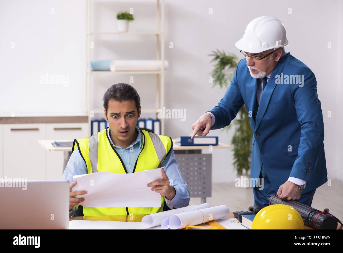 Two architects working in an office Stock Photo