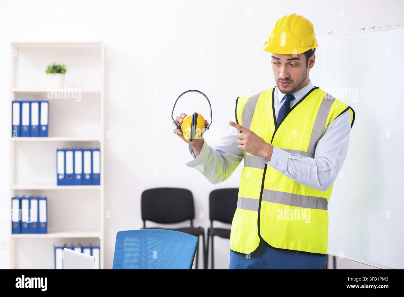 Young architect in presentation concept Stock Photo