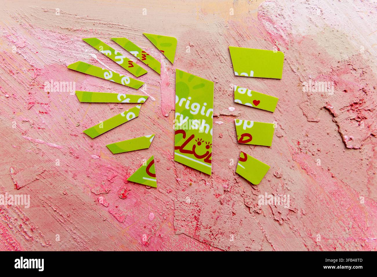 Green plastic loyalty card for the original Factory Shop which went into administration at the start of 2026 so the card is cut into pieces. Stock Photo