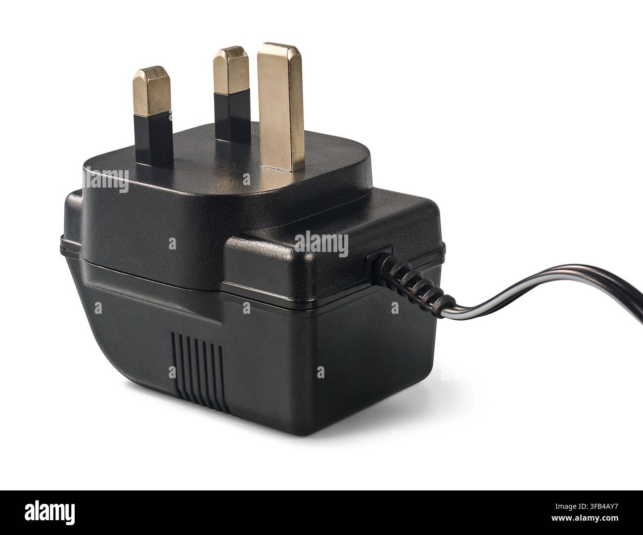 black uk power adapter plug isolated white background, three brass pins and attached electrical wire cord, electrical equipment in side view Stock Photo
