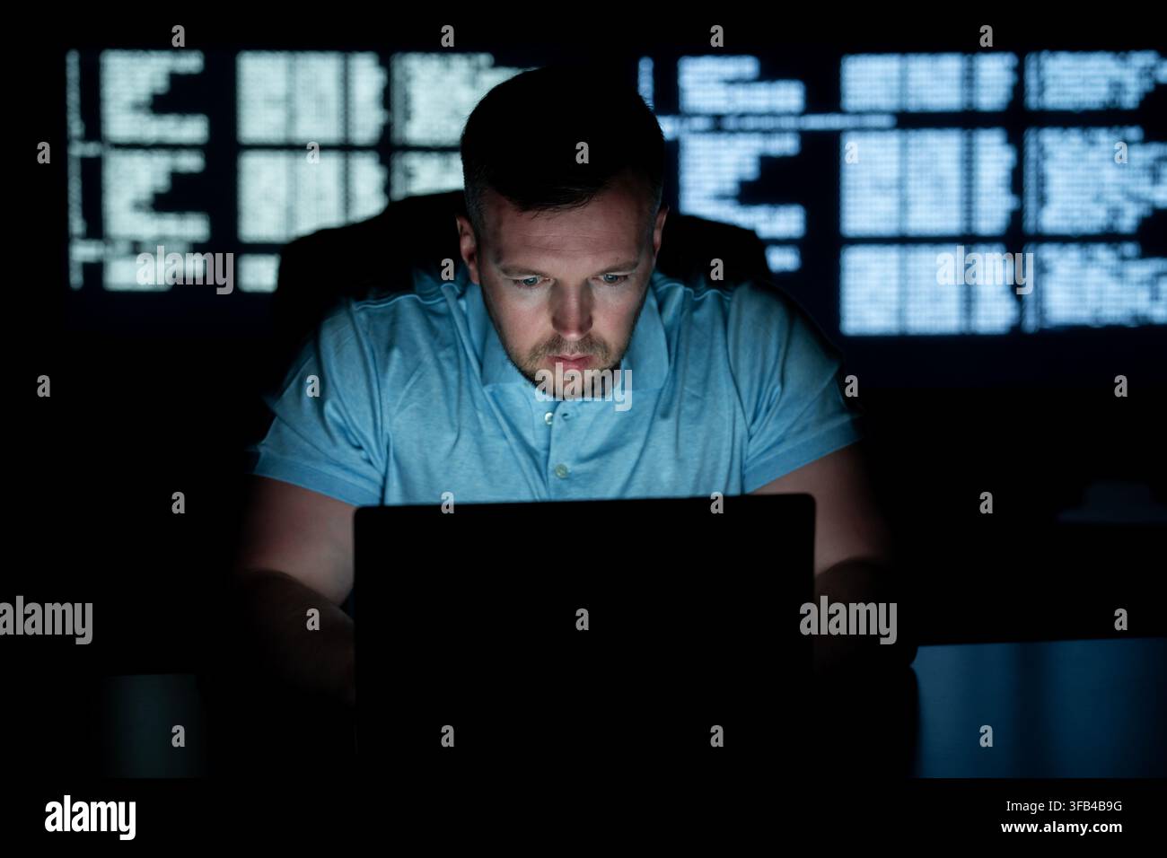 Developer works on secure software. Developer writes protection code system. Developer analyzes network vulnerabilities. Developer prevents cyber Stock Photo