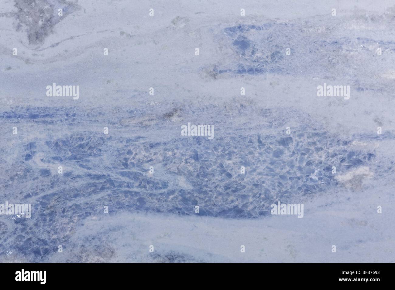 Unusual marble texture in light blue colour. Stock Photo