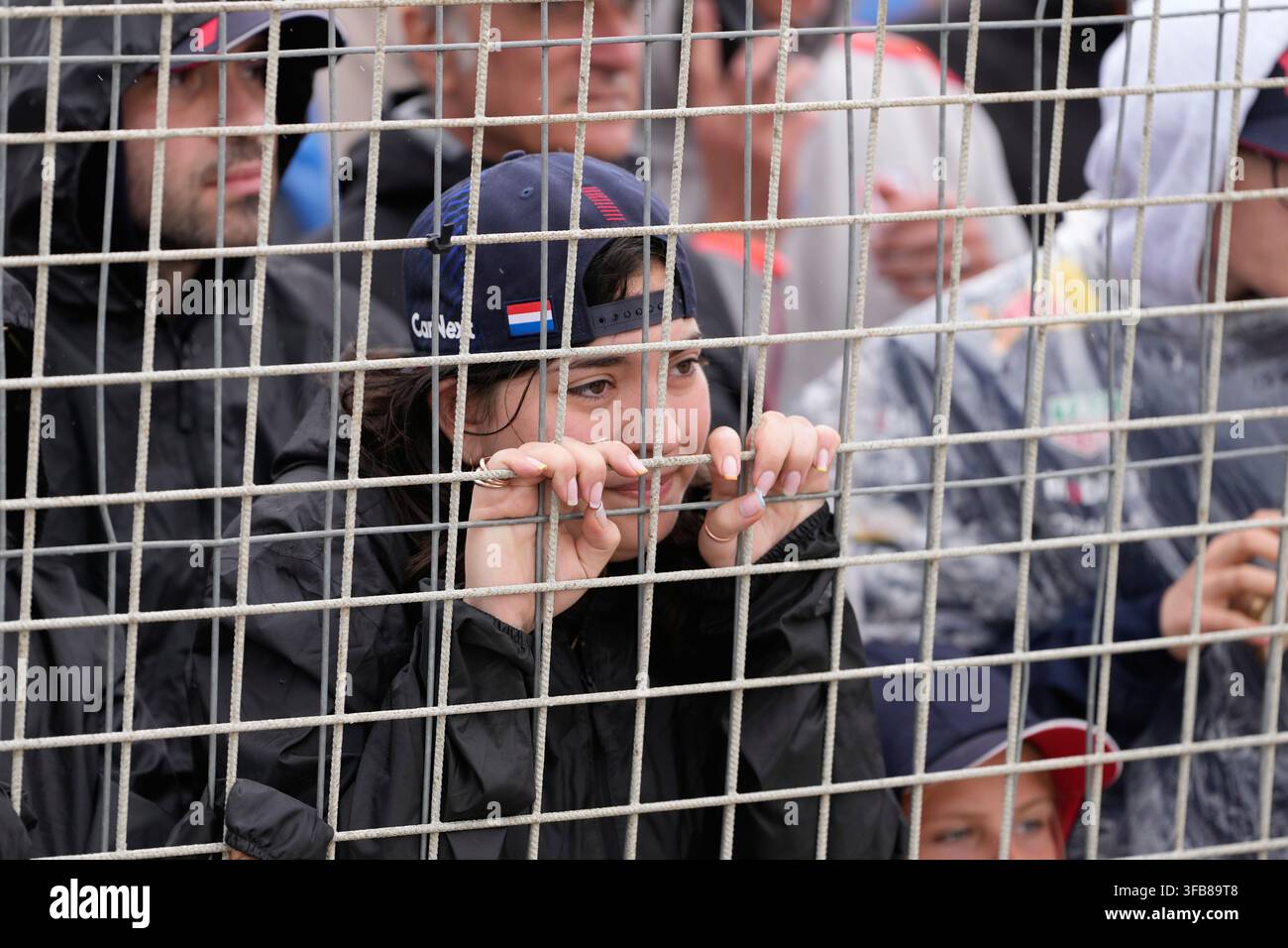 A fan waits for the start of the Formula One Dutch Grand Prix in ...