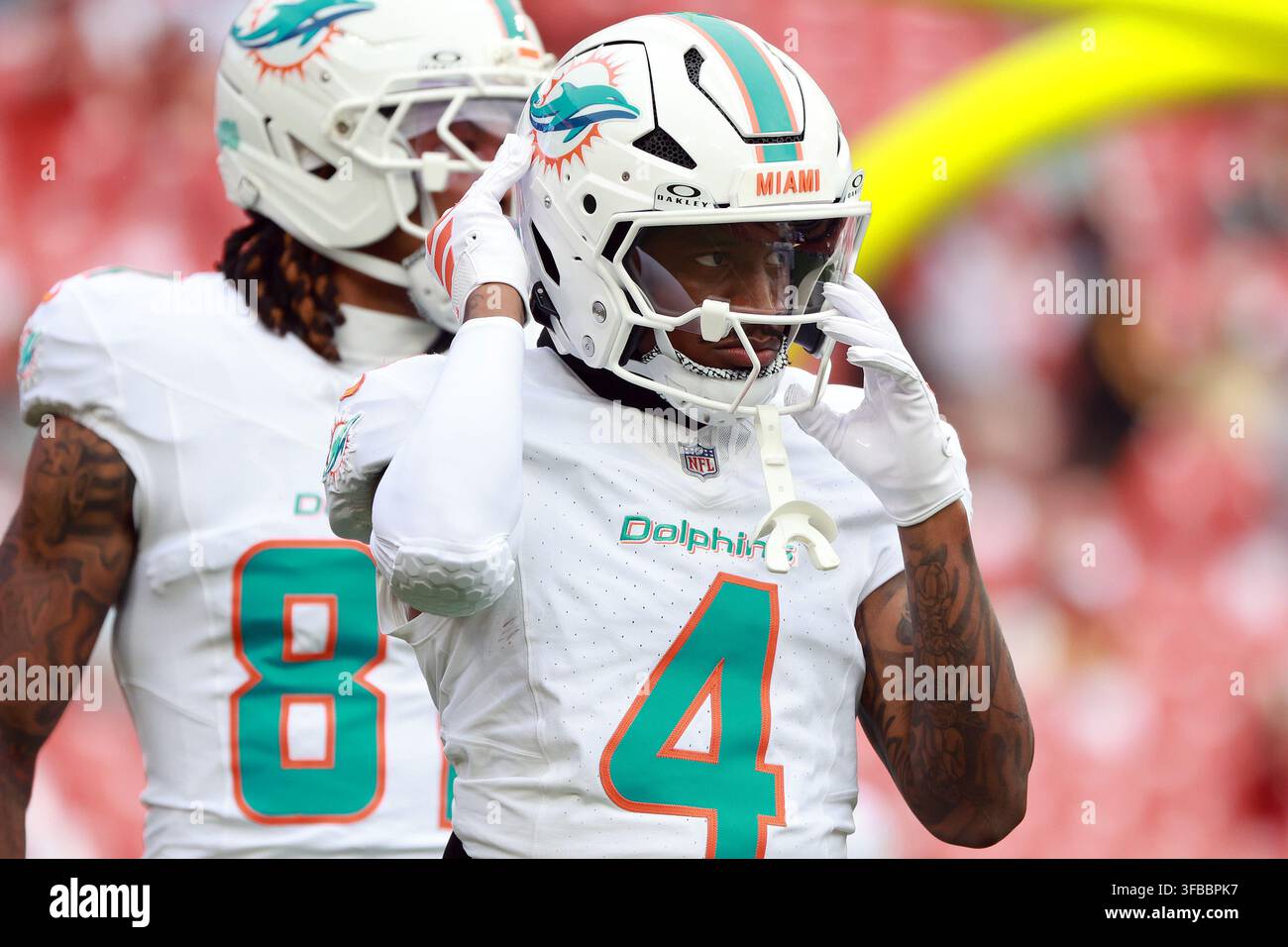 Miami Dolphins wide receiver Tutu Atwell (4) looks on before an NFL ...