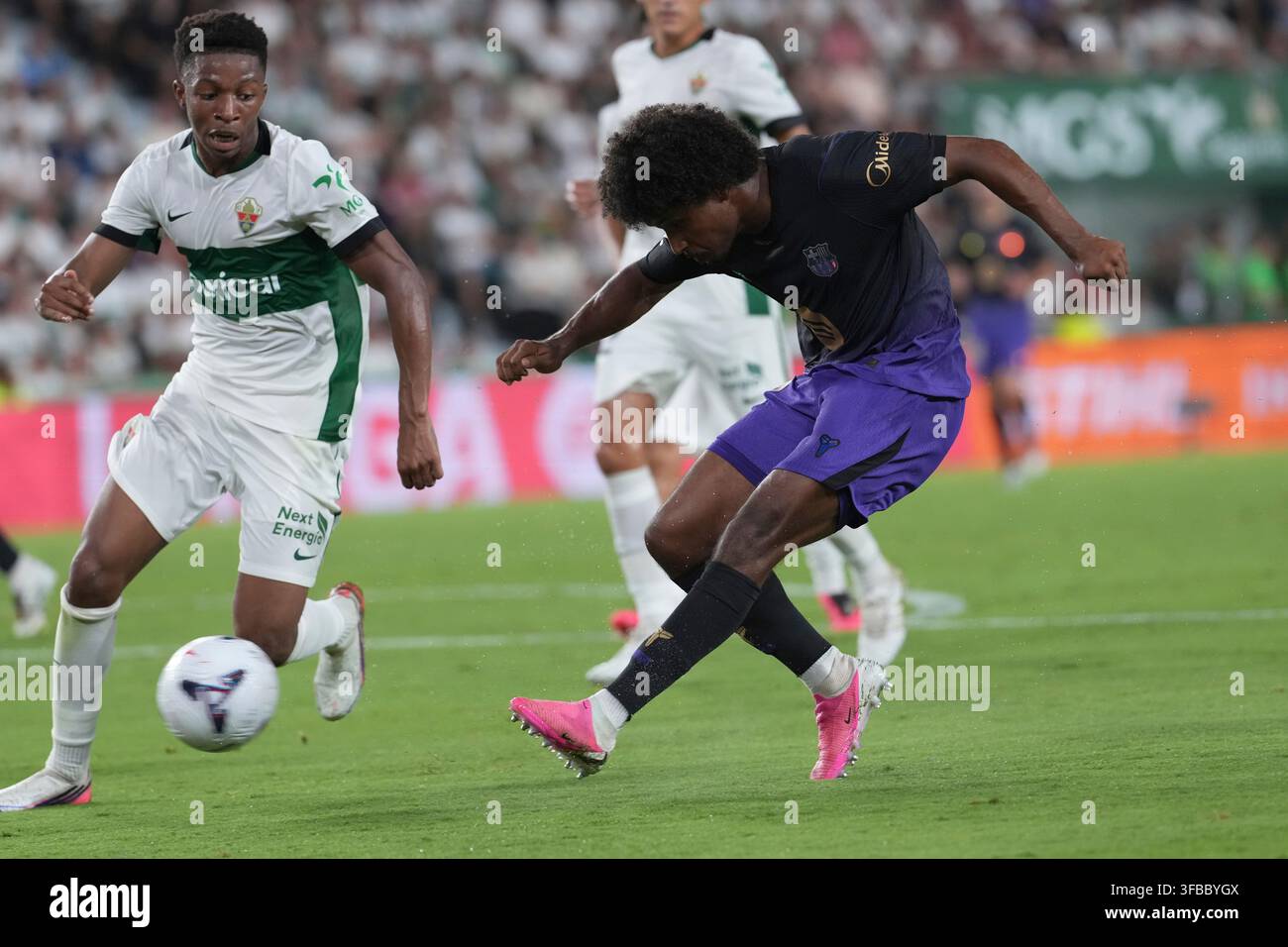 Barcelona s Karim Adeyemi Tries A Shot During A Spanish La Liga Soccer barcelona-s-karim-adeyemi-tries-a-shot-during-a-spanish-la-liga-soccer