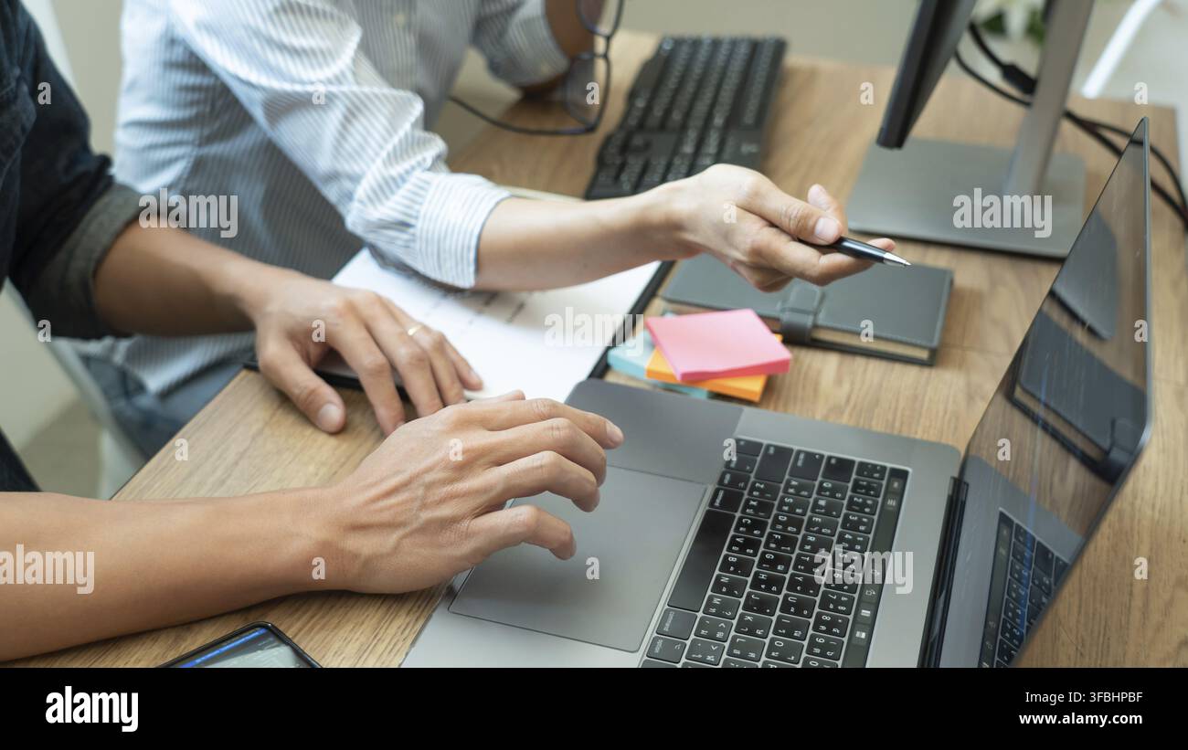 Team of programmers working together development Website design and coding technologies in a software develop company office, Coworkers Team concept Stock Photo