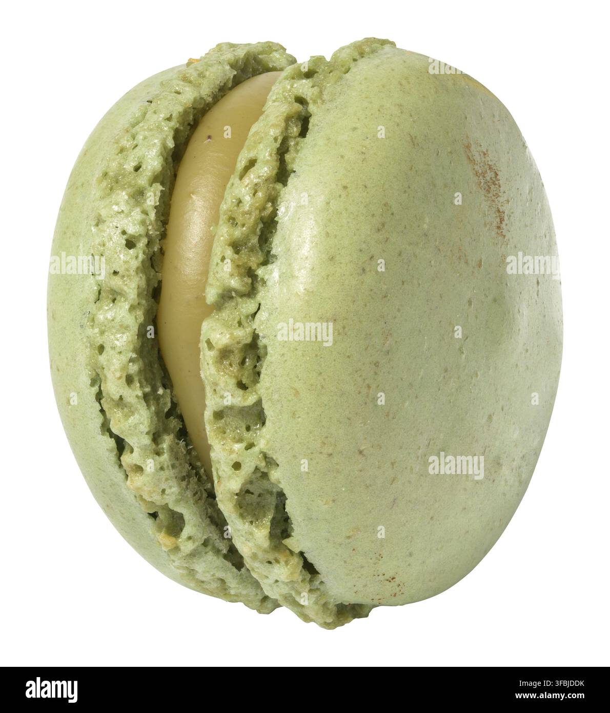Green pistachio macaron on white isolated background Stock Photo
