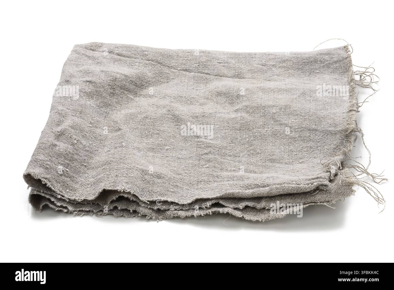 Folded gray linen tea towel on white background, close up Stock Photo