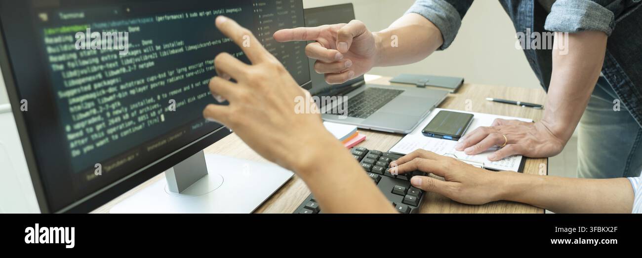 Collaborative work Software engineers website developer technologies or programmer working coding on startup ai application project on screen with par Stock Photo