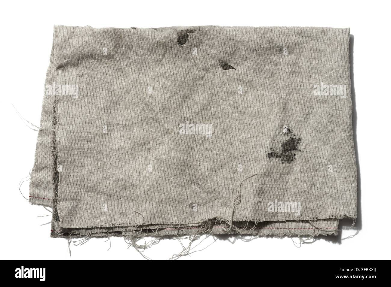 Folded gray linen tea towel on white background, close up Stock Photo
