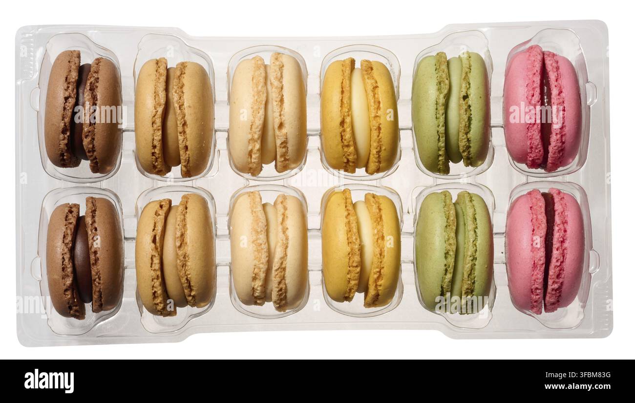 Macarons in plastic box on isolated background, top view Stock Photo