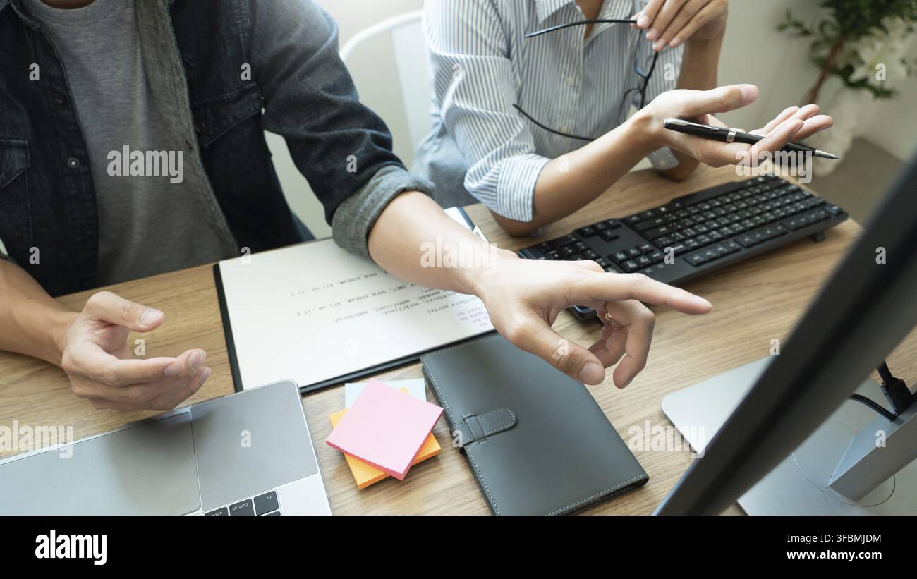 Team of programmers working together development Website design and coding technologies in a software develop company office, Coworkers Team concept Stock Photo