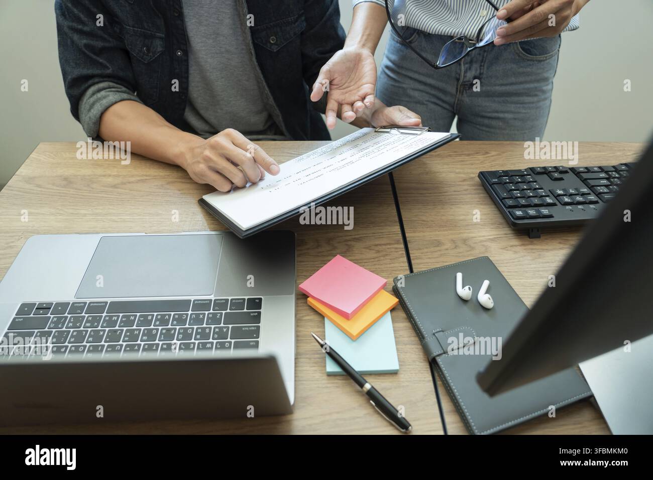 Collaborative work Software engineers website developer technologies or programmer working coding on startup ai application project on screen with par Stock Photo
