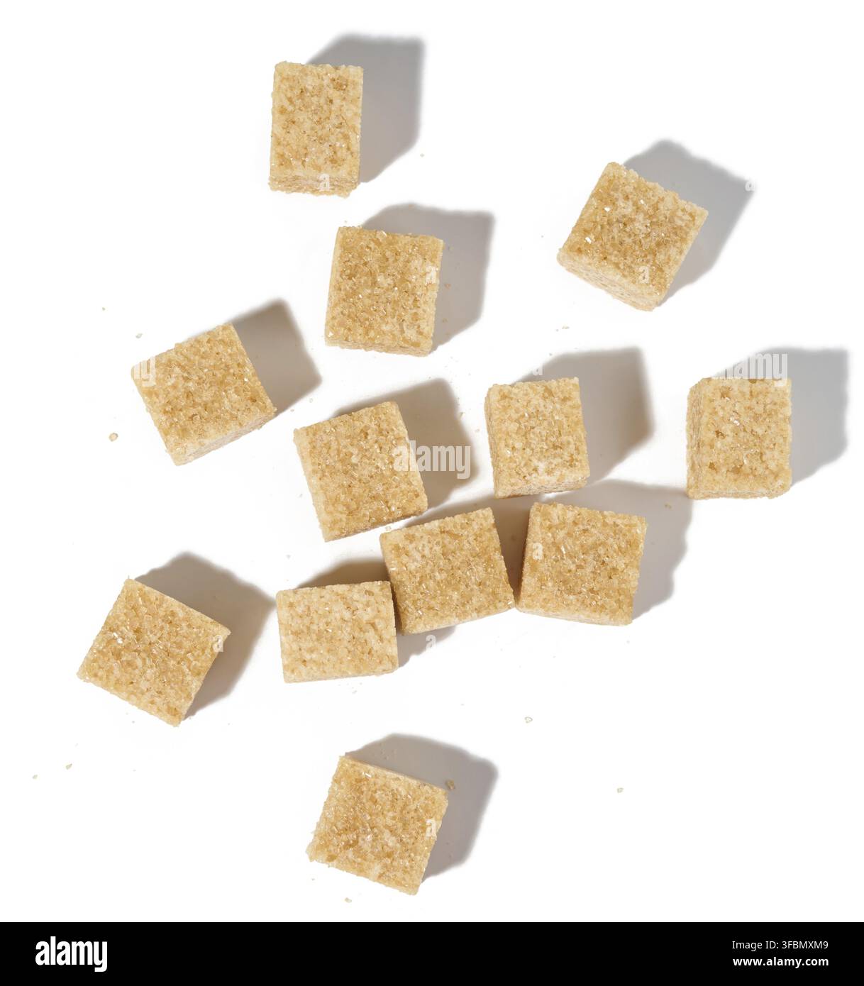 Cane sugar cubes on white background, top view Stock Photo