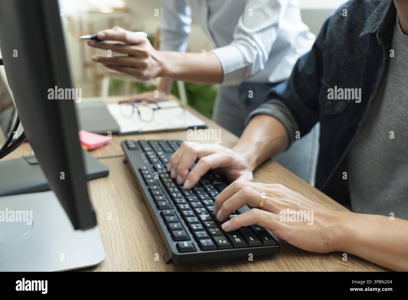 Collaborative work Software engineers website developer technologies or programmer working coding on startup ai application project on screen with par Stock Photo