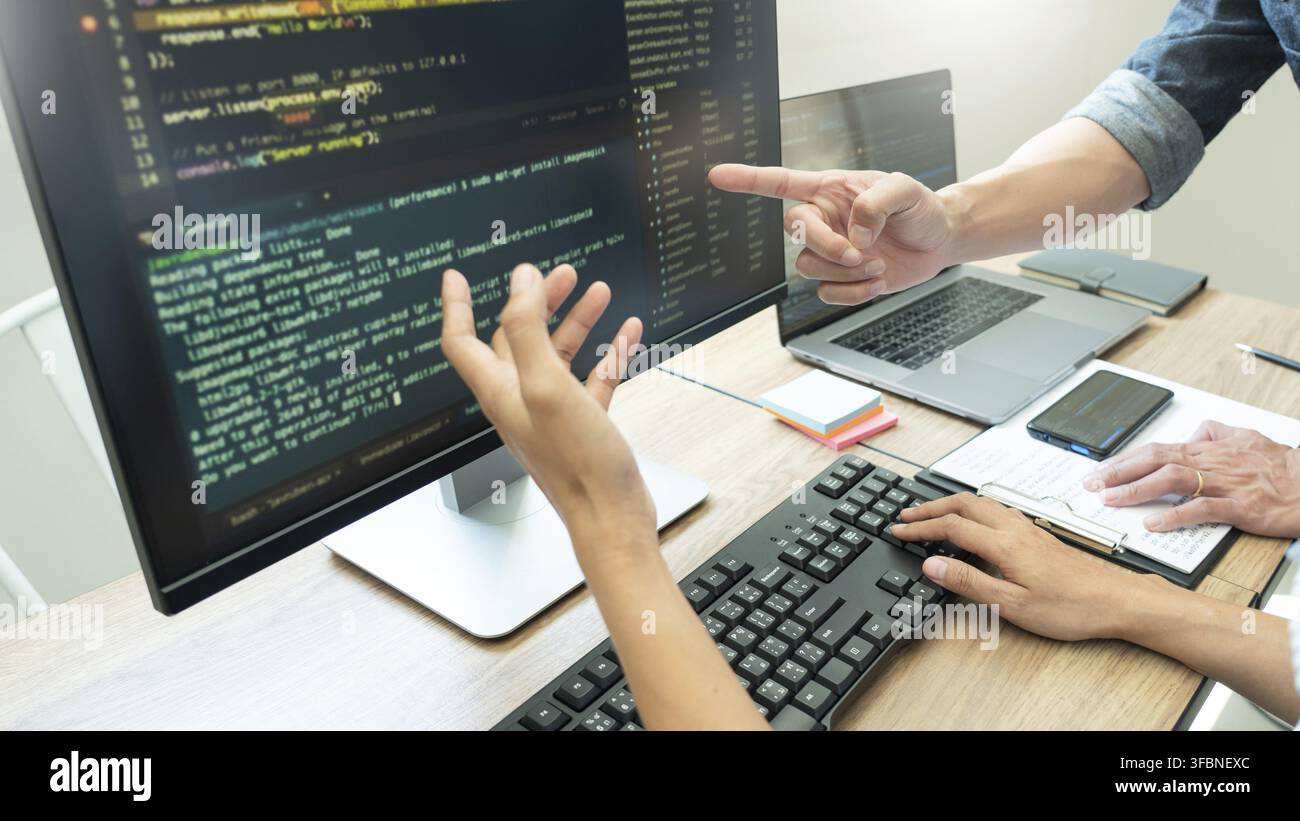 Team of programmers working together development Website design and coding technologies in a software develop company office, Coworkers Team concept Stock Photo
