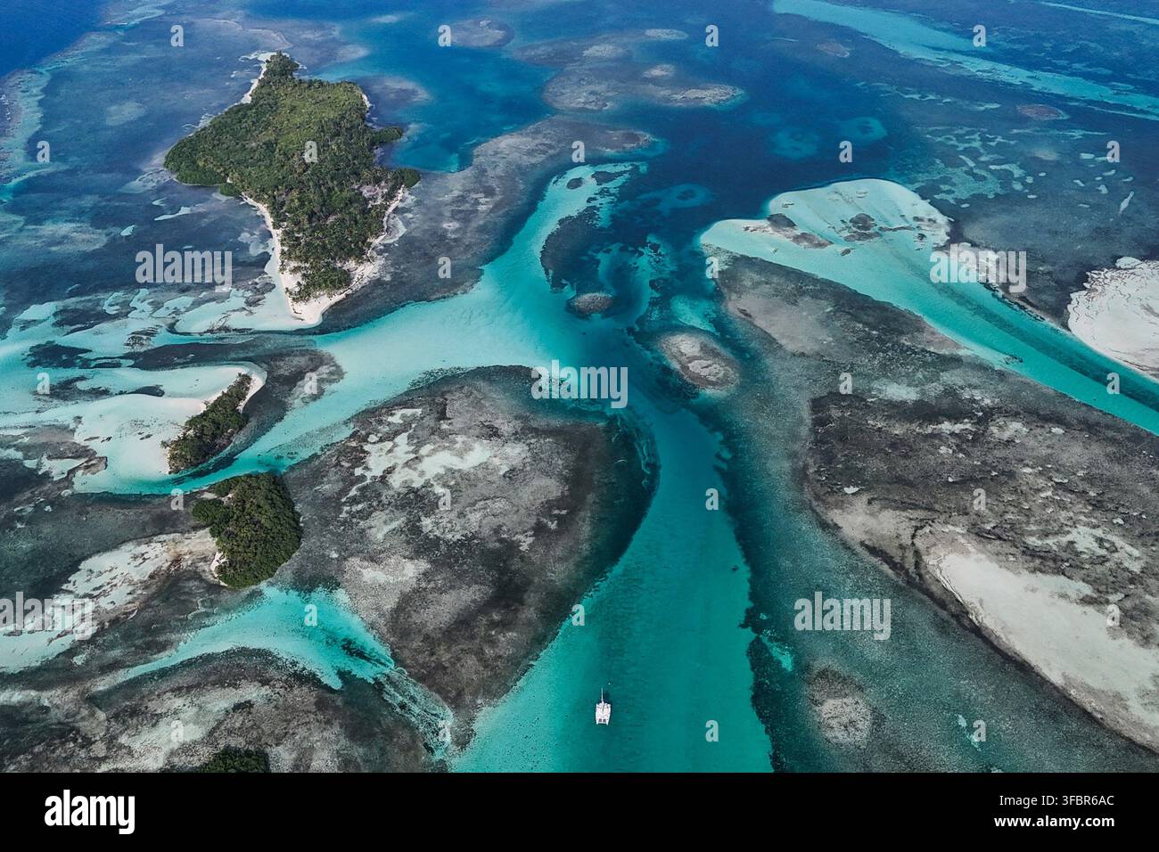A boat is anchored in the Dutch Cays of Guna Yala on the Caribbean ...