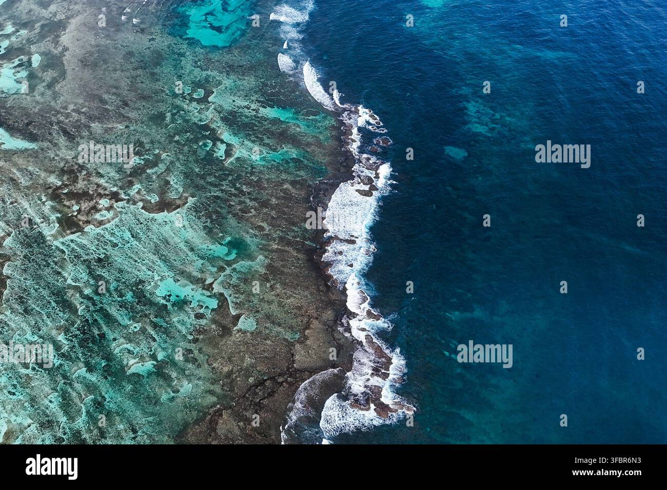 Waves crash against the reef of the Dutch Cays in Guna Yala on Panama's ...