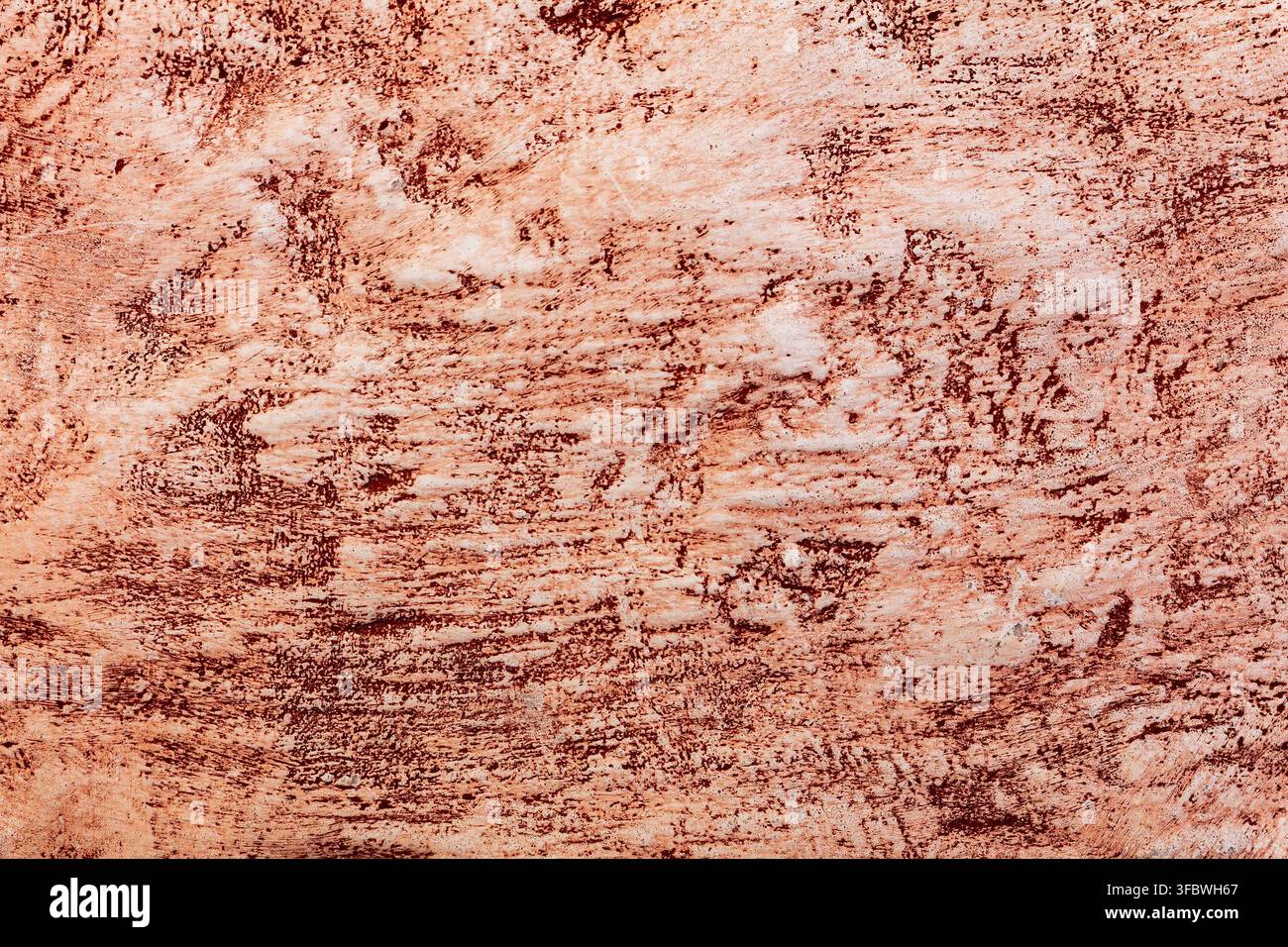 Weathered red painted plaster wall texture Stock Photo