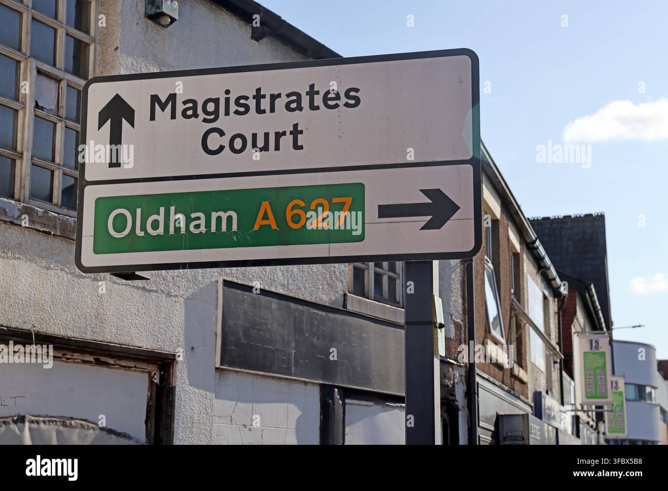 Road sign directing visitors to Tameside Magistrates’ Court in Ashton-under-Lyne, Greater Manchester. Stock Photo