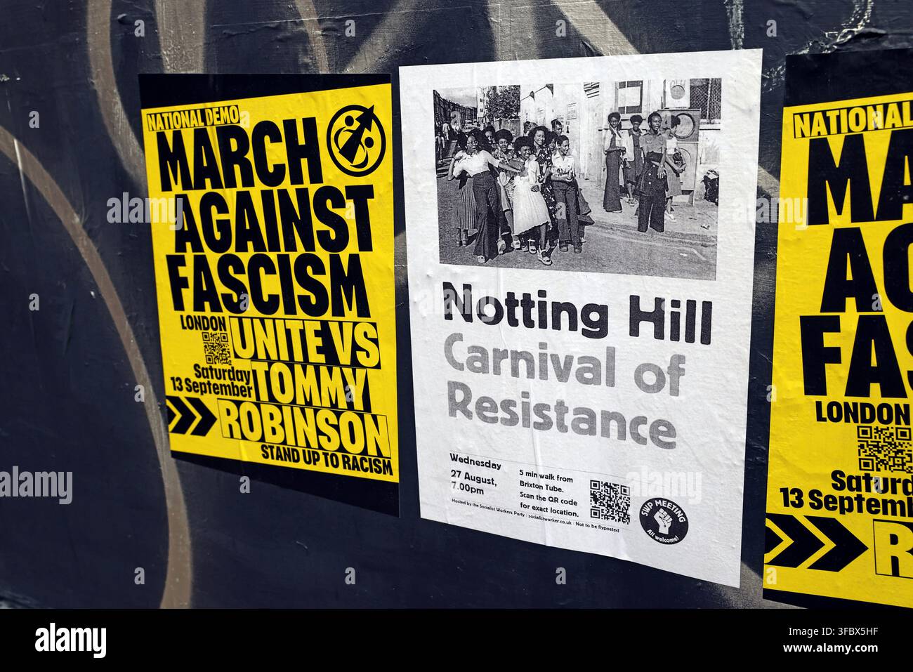 Anti-fascist and Notting Hill Carnival resistance posters displayed together in London, England, UK. Stock Photo