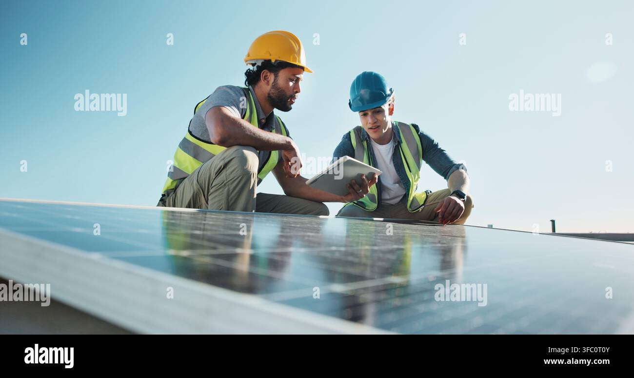 Technician, team and outdoor at solar panel with tablet, planning ...
