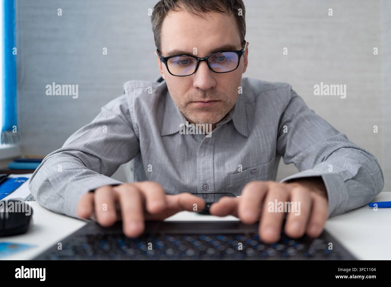 Coding, office and man on computer for programming, system upgrade and software design. Network, IT programmer and worker with pc for web development, Stock Photo