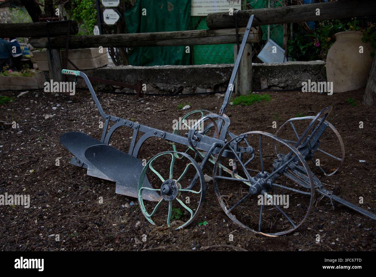 Antique farming equipment on display in Rosh Pina, Northern Galilee, Israel Stock Photo