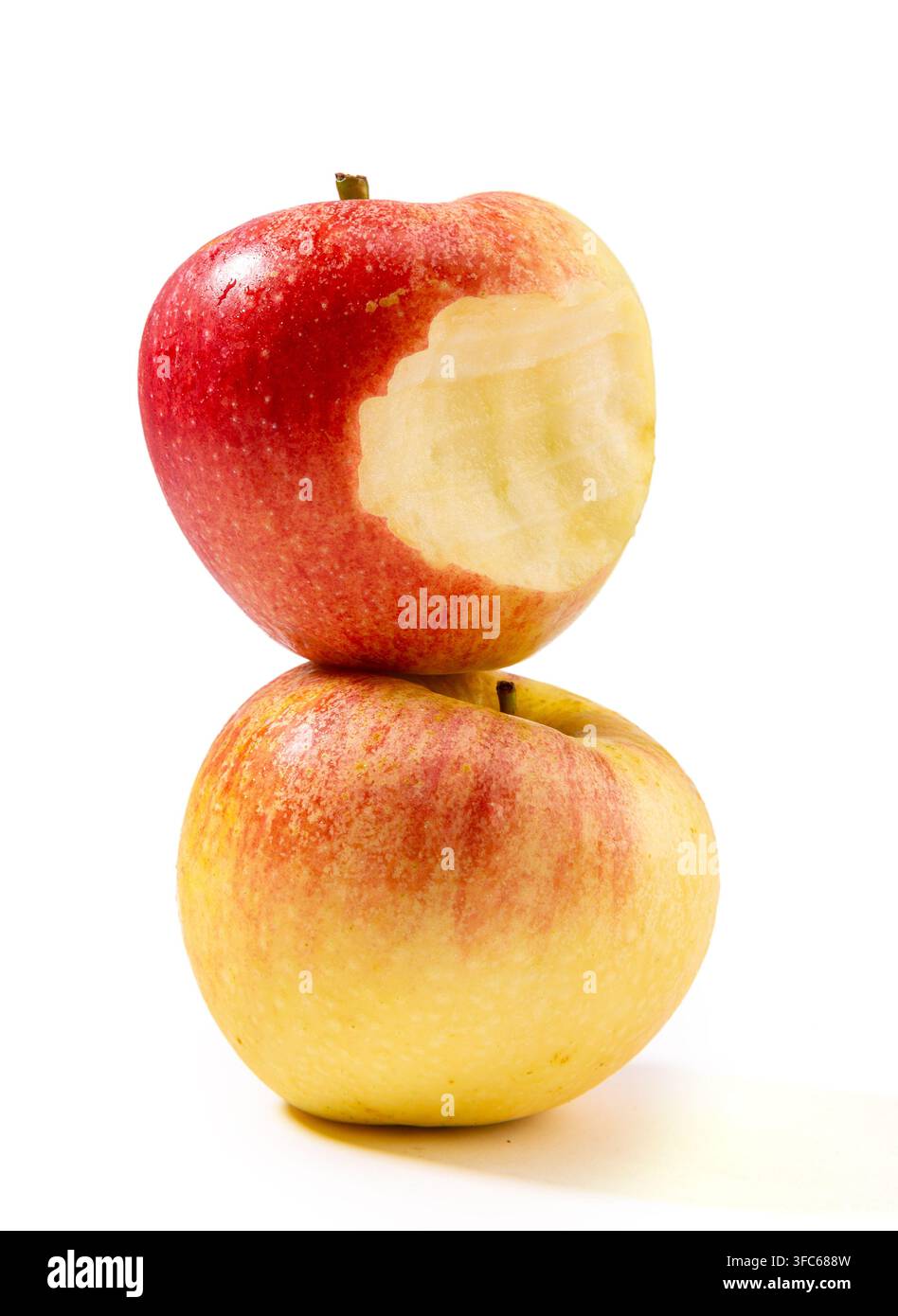 Whole and Half Cut Red Gala Apple Stock Photo