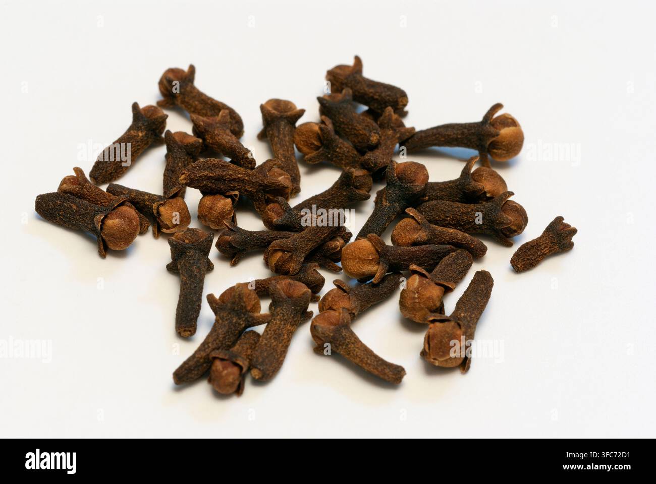 Dried cloves on white background Stock Photo