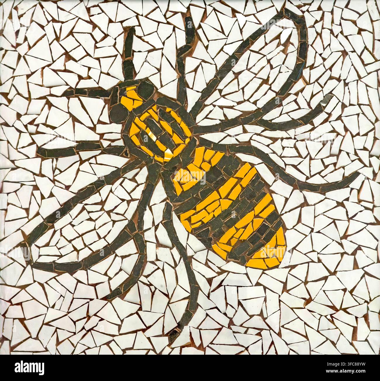 Ceramic mosaic of the Manchester worker bee, the city’s long-established symbol of industry, labour and civic identity. Stock Photo