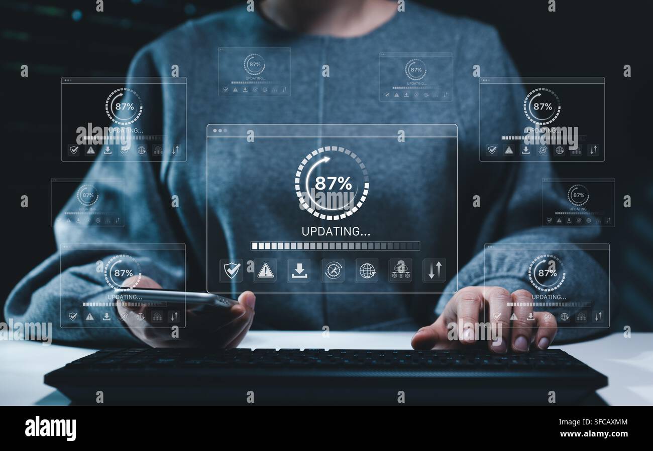 Software update and cybersecurity concept. User operating keyboard and smartphone with progress interfaces, system maintenance, data protection, insta Stock Photo