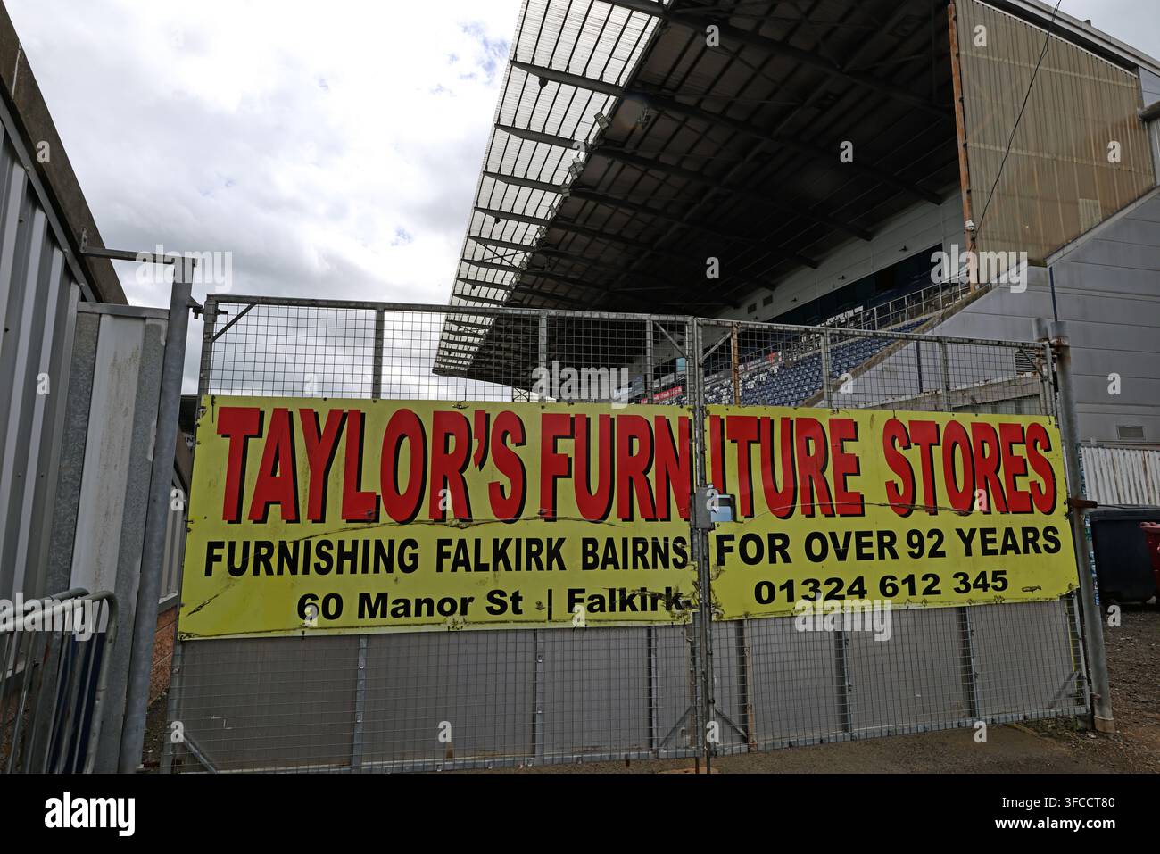 Taylor's Furniture Stores advertising at Falkirk Stadium, showing local sponsorship of Falkirk FC Stock Photo