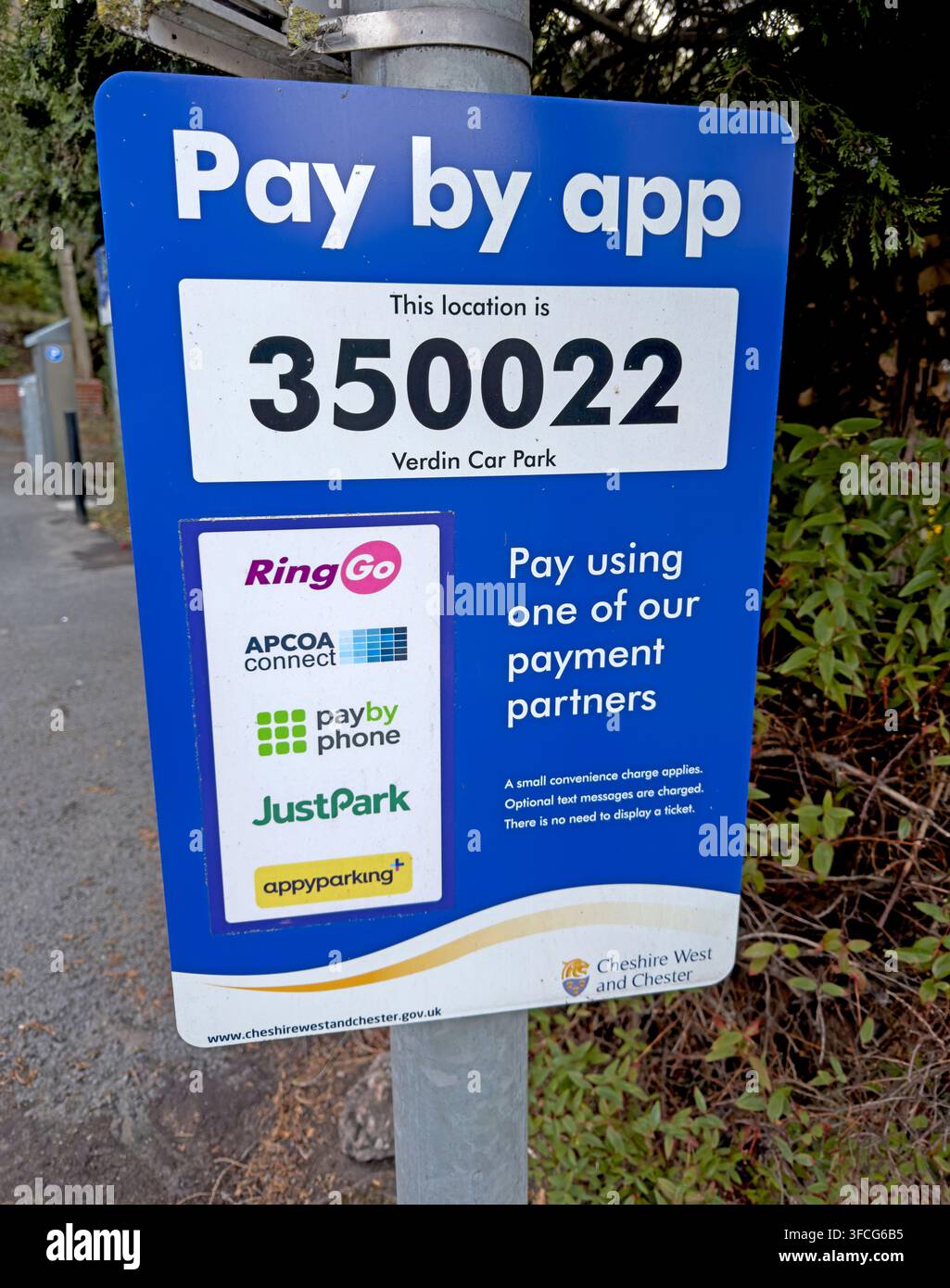 Pay by app parking sign at Verdin Park car park, Northwich, showing multiple cashless parking apps Stock Photo