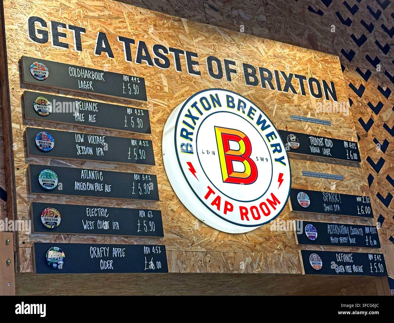 Brixton Brewery tap room beer board advertising craft lager, IPA, ale and cider in Brixton, London Stock Photo