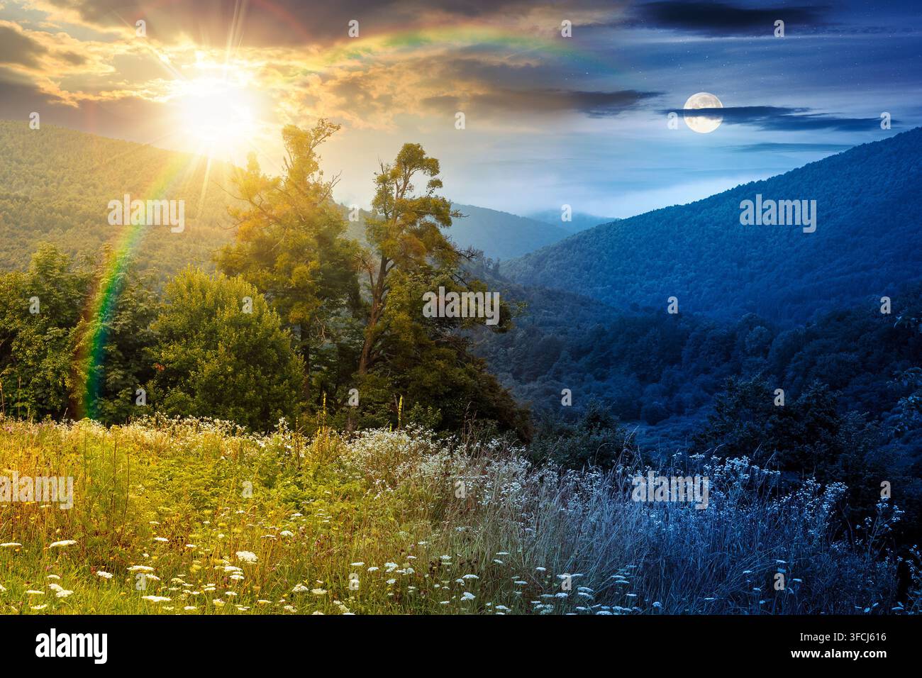 rural mountain landscape of ukraine at twilight. countryside scenery of transcarpathia in summer. night meet day concept. forested hills and grassy me Stock Photo