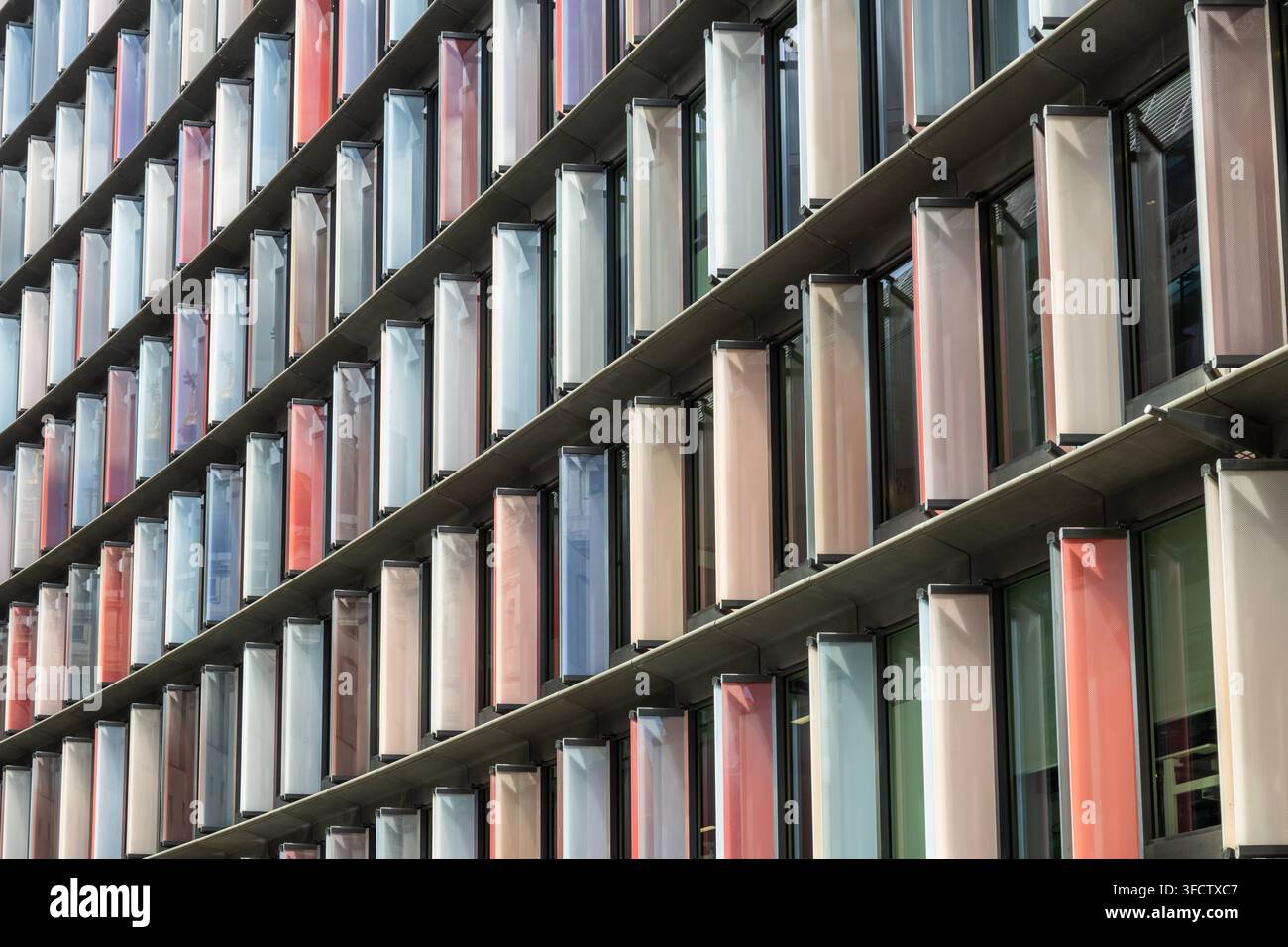 Modern building facade with colorful vertical panels Stock Photo